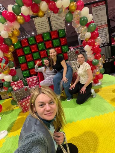 Decorating the Venue Founders and a volunteer preparing and decorating the venue for tomorrow’s event.